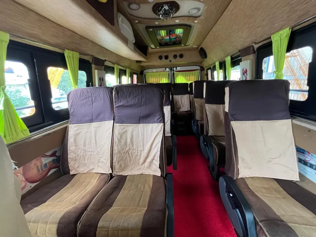 luxury 12 seater tempo traveller interior image